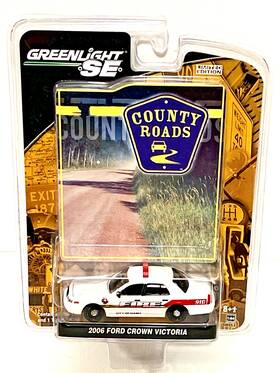 Greenlight 810166011792 New 2006 Ford Crown Victoria Nash Fire Green Machine County Roads 3
