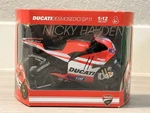 Nicky Hayden 1:12 Scale Die-cast Replica Of Ducati Desmosedici GP11 New Ray Nib. Fixed Price $125.00.