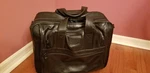 Tumi Alpha Deluxe 9201D3 Black Leather Wheeled Rolling Laptop Briefcase Carry-on. Fixed Price $125.00.
