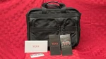 Tumi 2206D3 Black Ballistic Wheeled Expandable Briefcase/laptop Bag Wheels. Fixed Price $65.00.