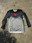 Fox Racing Youth 180 Interfere Jersey Grey & Red Size 32035-037-YXL. Fixed Price $30.00.