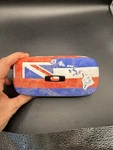 Oakley Hawaii Flag Square Case. Fixed Price $142.50.