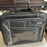 Briggs Riley Travelware Expandable Rolling Brief Case Bag VR250X-4 Black. Fixed Price $89.99.