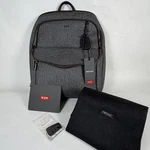 New Tumi Sinclair Harlow Backpack 79491EG Earl Gray Canvas Black Leather Trim. Fixed Price $349.50.