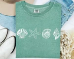 Sea Shell Comfort Tee Ocean Beach Shirt Coastal Vacation Gift. Fixed Price $20.58.