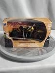 Newray 1934 Indian Sport Scout 1:12 Diecast Motorcycle Yellow Brown Damaged Box. Fixed Price $55.00.