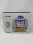 Crosley Diner Jukebox Tabletop Bluetooth Radio Chrome Plated CR1120A-SI New***. Fixed Price $35.00.