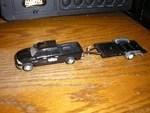 Greenlight Hitch & Tow 1/64 Gas Monkey Garage Dodge Ram 1500 Trailer Free Sh. Fixed Price $29.99.